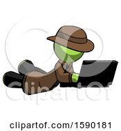 Poster, Art Print Of Green Detective Man Using Laptop Computer While Lying On Floor Side Angled View