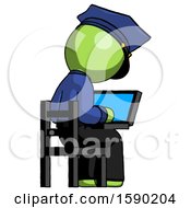 Poster, Art Print Of Green Police Man Using Laptop Computer While Sitting In Chair View From Back