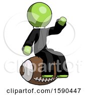 Poster, Art Print Of Green Clergy Man Sitting On Giant Football