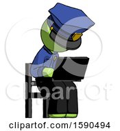 Poster, Art Print Of Green Police Man Using Laptop Computer While Sitting In Chair Angled Right