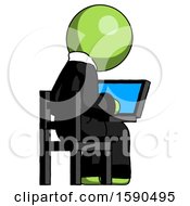 Poster, Art Print Of Green Clergy Man Using Laptop Computer While Sitting In Chair View From Back