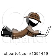 Ink Detective Man Using Laptop Computer While Lying On Floor Side View