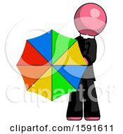 Pink Clergy Man Holding Rainbow Umbrella Out To Viewer
