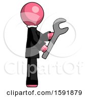 Pink Clergy Man Using Wrench Adjusting Something To Right