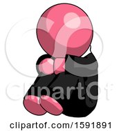 Pink Clergy Man Sitting With Head Down Facing Angle Left