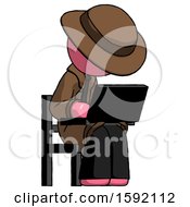 Poster, Art Print Of Pink Detective Man Using Laptop Computer While Sitting In Chair Angled Right