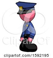 Poster, Art Print Of Pink Police Man Kneeling Angle View Left