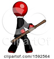 Red Clergy Man Holding Bo Staff In Sideways Defense Pose