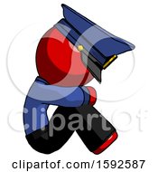 Poster, Art Print Of Red Police Man Sitting With Head Down Facing Sideways Right