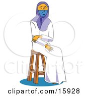 Islamic Woman In A White Dress Her Face Covered In Niqab Veil Sitting On A Stool