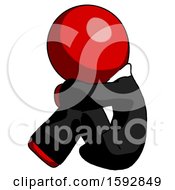 Poster, Art Print Of Red Clergy Man Sitting With Head Down Facing Sideways Left