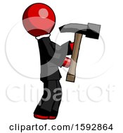 Red Clergy Man Hammering Something On The Right