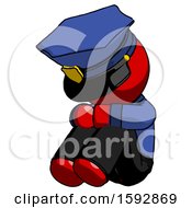 Poster, Art Print Of Red Police Man Sitting With Head Down Facing Angle Left