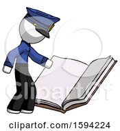 White Police Man Reading Big Book While Standing Beside It