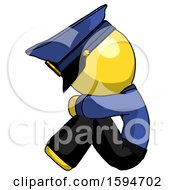 Poster, Art Print Of Yellow Police Man Sitting With Head Down Facing Sideways Left