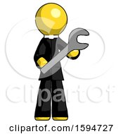 Poster, Art Print Of Yellow Clergy Man Holding Large Wrench With Both Hands