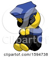 Poster, Art Print Of Yellow Police Man Sitting With Head Down Facing Angle Left