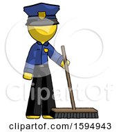Yellow Police Man Standing With Industrial Broom