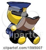Yellow Police Man Reading Book While Sitting Down