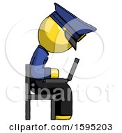 Poster, Art Print Of Yellow Police Man Using Laptop Computer While Sitting In Chair View From Side