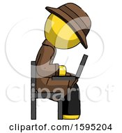Poster, Art Print Of Yellow Detective Man Using Laptop Computer While Sitting In Chair View From Side