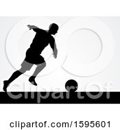 Poster, Art Print Of Black Silhouetted Male Soccer Player Over Gray