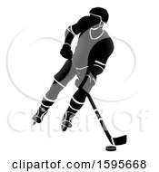 Clipart Of A Silhouetted Male Ice Hockey Player Royalty Free Vector Illustration