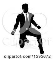 Poster, Art Print Of Silhouetted Business Man With A Shadow On A White Background