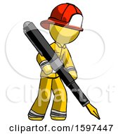 Yellow Firefighter Fireman Man Drawing Or Writing With Large Calligraphy Pen