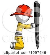 White Firefighter Fireman Man Posing With Giant Pen In Powerful Yet Awkward Manner