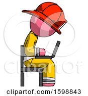 Poster, Art Print Of Pink Firefighter Fireman Man Using Laptop Computer While Sitting In Chair View From Side