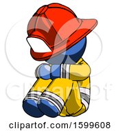 Blue Firefighter Fireman Man Sitting With Head Down Facing Angle Left