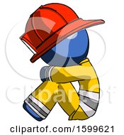 Blue Firefighter Fireman Man Sitting With Head Down Facing Sideways Left