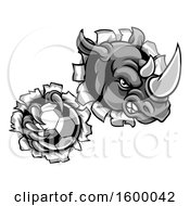 Poster, Art Print Of Tough Rhino Monster Mascot Holding A Soccer Ball In One Clawed Paw And Breaking Through A Wall