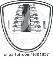Clipart Of A Shield Frame With A Screw Bolt And Wrenches Royalty Free Vector Illustration by Vector Tradition SM