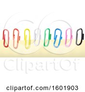 Clipart Of Colorful Paperclips On A Piece Of Paper Royalty Free Vector Illustration