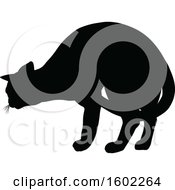 Clipart Of A Black Silhouetted Cat Royalty Free Vector Illustration