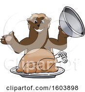 Clipart Of A Wolverine School Mascot Character Serving A Thanksgiving Turkey Royalty Free Vector Illustration