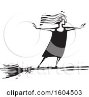Clipart Of A Witch Standing And Flying On A Broom In Black And White Woodcut Royalty Free Vector Illustration by xunantunich