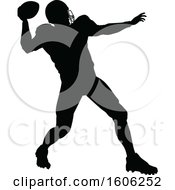 Clipart Of A Silhouetted Football Player Throwing Royalty Free Vector Illustration by AtStockIllustration
