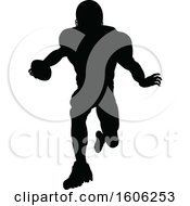 Clipart Of A Silhouetted Football Player Royalty Free Vector Illustration by AtStockIllustration