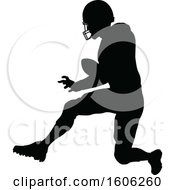 Clipart Of A Silhouetted Football Player Royalty Free Vector Illustration
