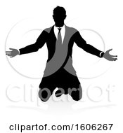 Poster, Art Print Of Silhouetted Business Man Kneeling With A Reflection Or Shadow On A White Background