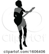 Poster, Art Print Of Silhouetted Female Guitarist