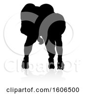 Poster, Art Print Of Silhouetted Football Player With A Reflection Or Shadow On A White Background