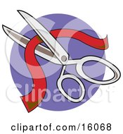 Pair Of Scissors Cutting Red Ribbon