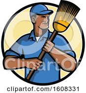 Black Male Street Cleaner Or Janitor Holding A Broom In A Circle