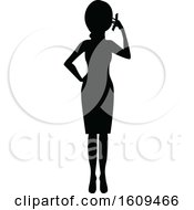 Poster, Art Print Of Silhouetted Business Woman Talking On A Cell Phone