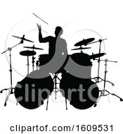 Clipart Of A Silhouetted Male Drummer Royalty Free Vector Illustration by AtStockIllustration