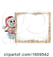 Poster, Art Print Of Christmas Snowman Wearing A Scarf And A Santa Hat By A Sign